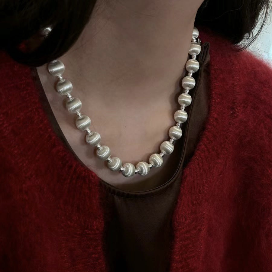 brushed metal sphere necklace set | minimalist long sweater chain & earrings with modern luxury design