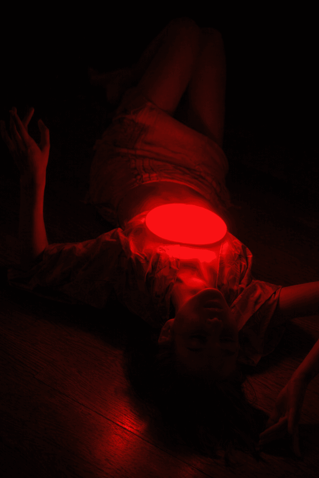 Red Light Bag glowing in hand